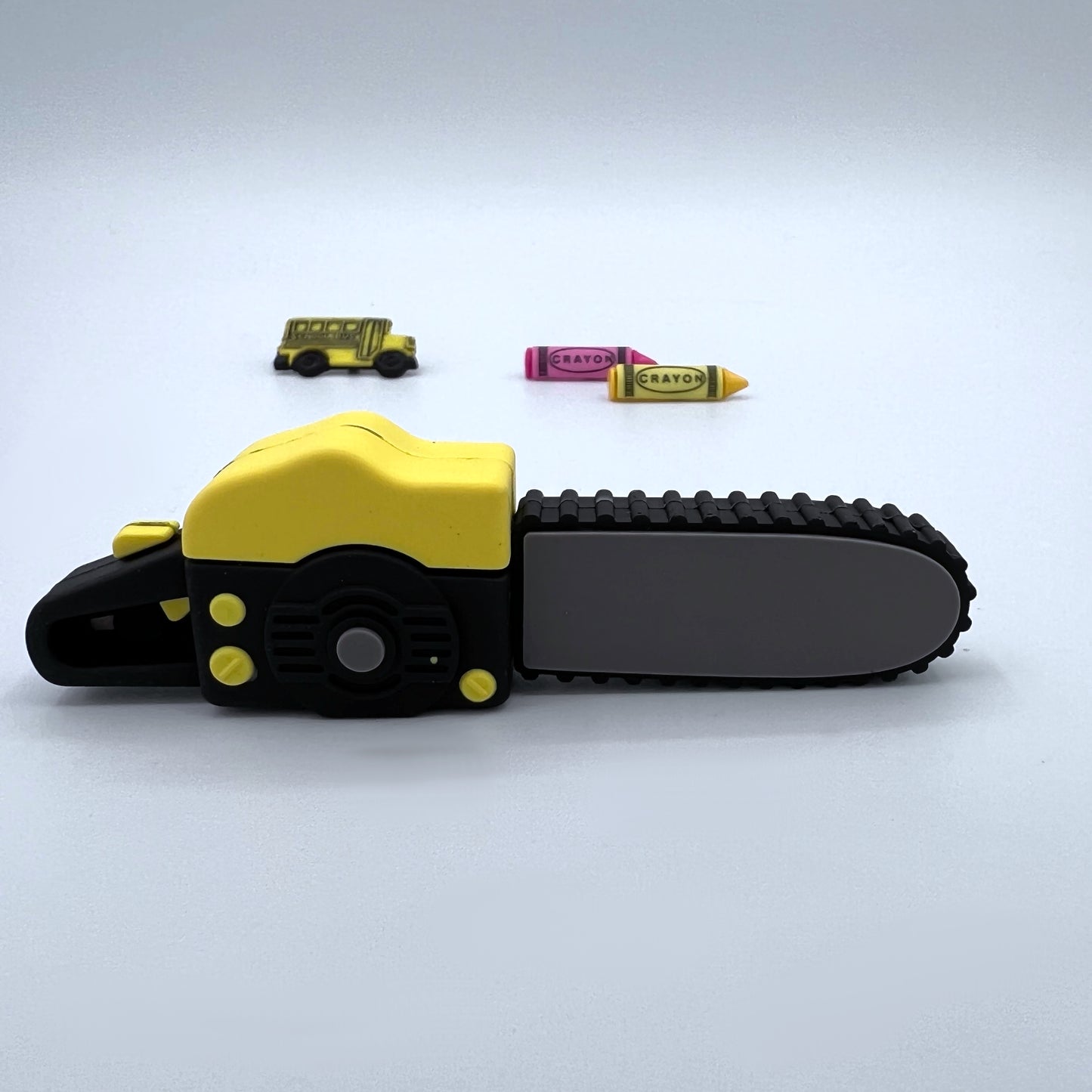 yellow & black chainsaw