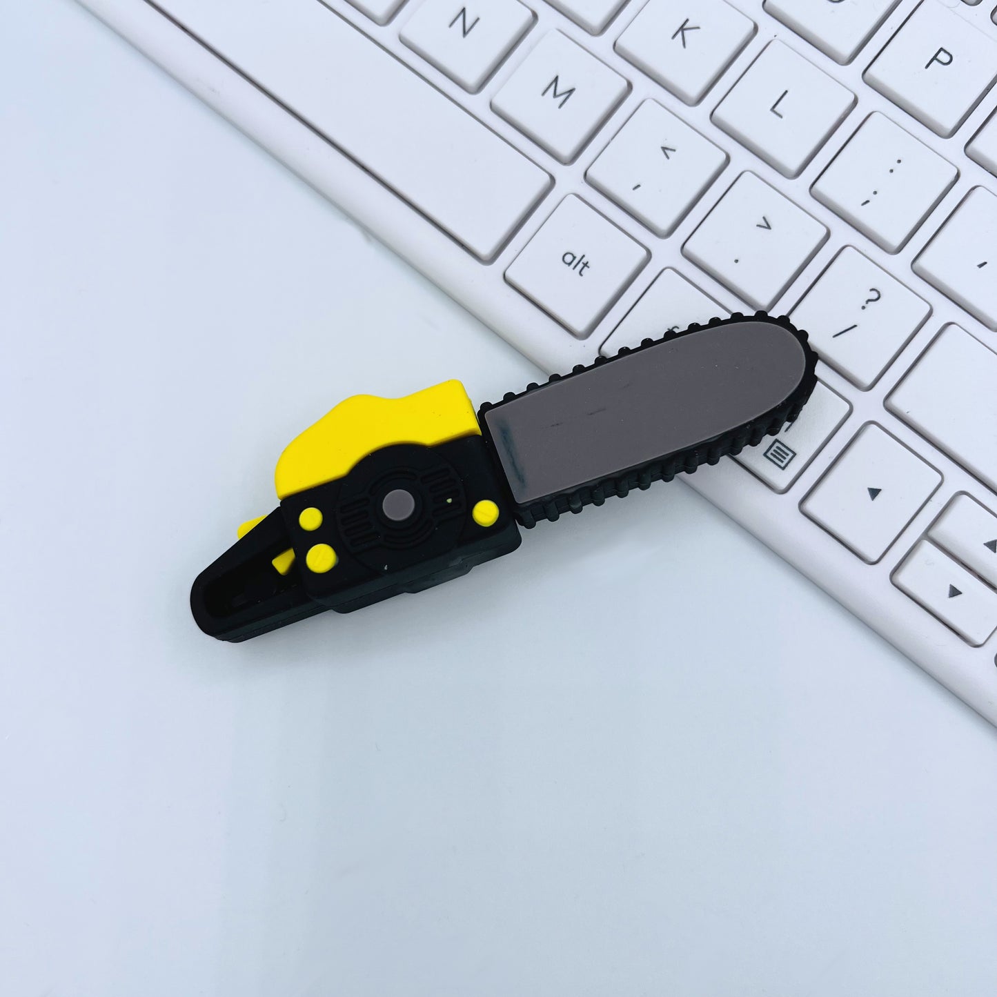 yellow & black chainsaw