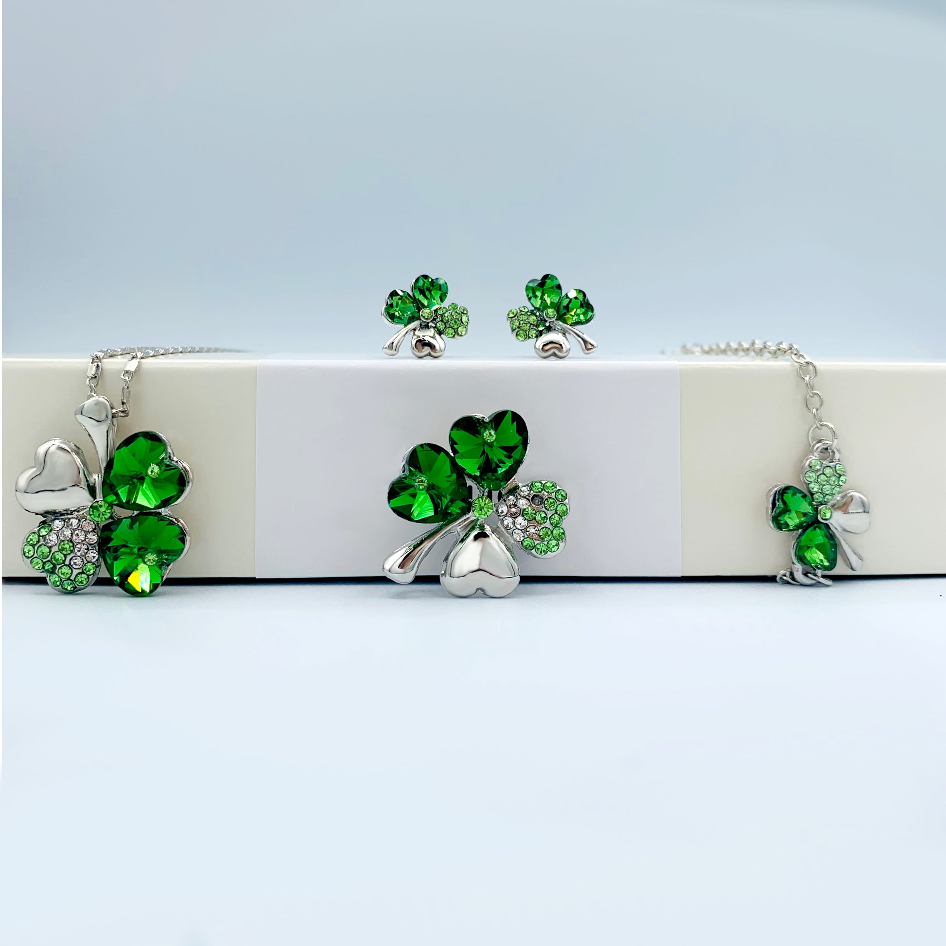 silver earrings necklace bracelet brooch